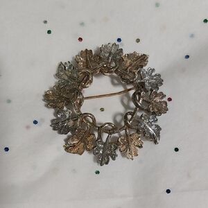 Elegant Gold and Silver Leaf Brooch